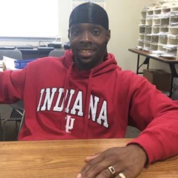 ABE student Jasper Wisdom smiling for the camera