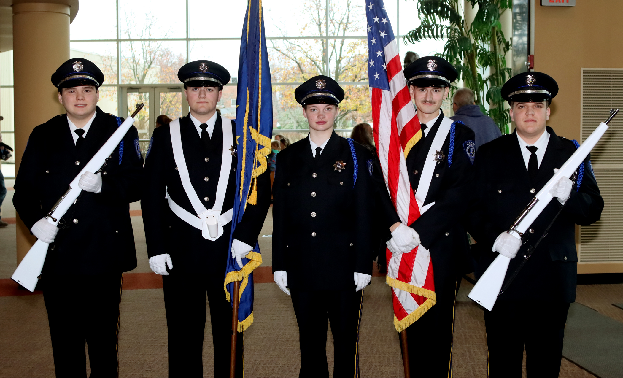 Cadet corps members standing together for a photo