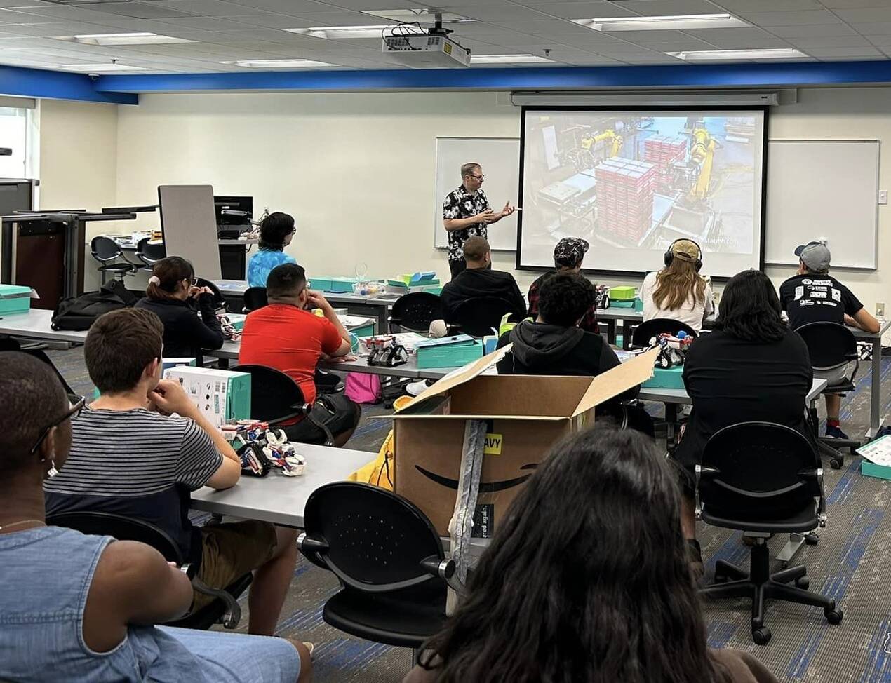 Instructor working with students through a lecture