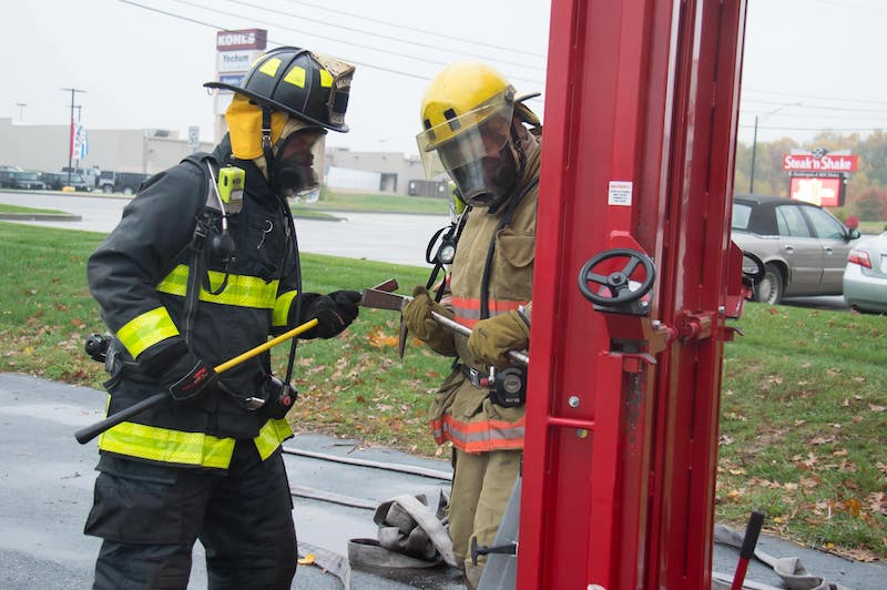 two firefighters