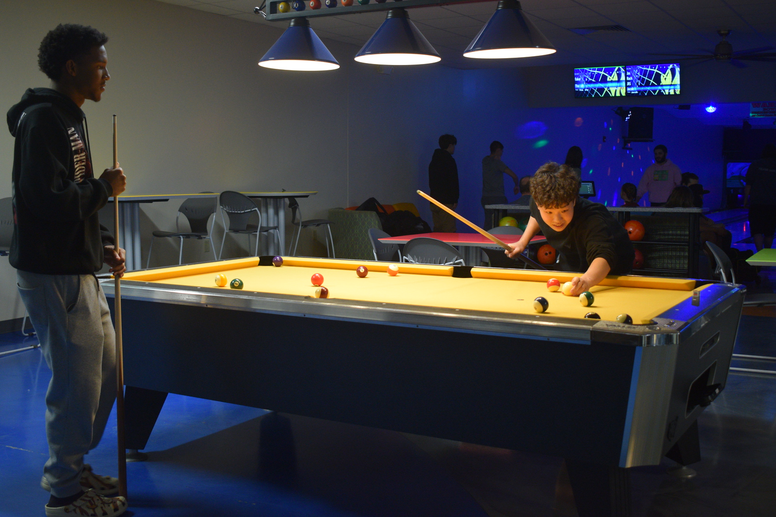 Vincennes University students relax and play some pool at the Jefferson Student Union and Bowling center on campus
