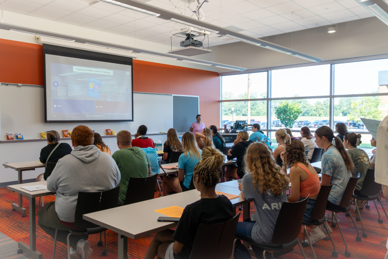 A new group of students come to campus for orientation.