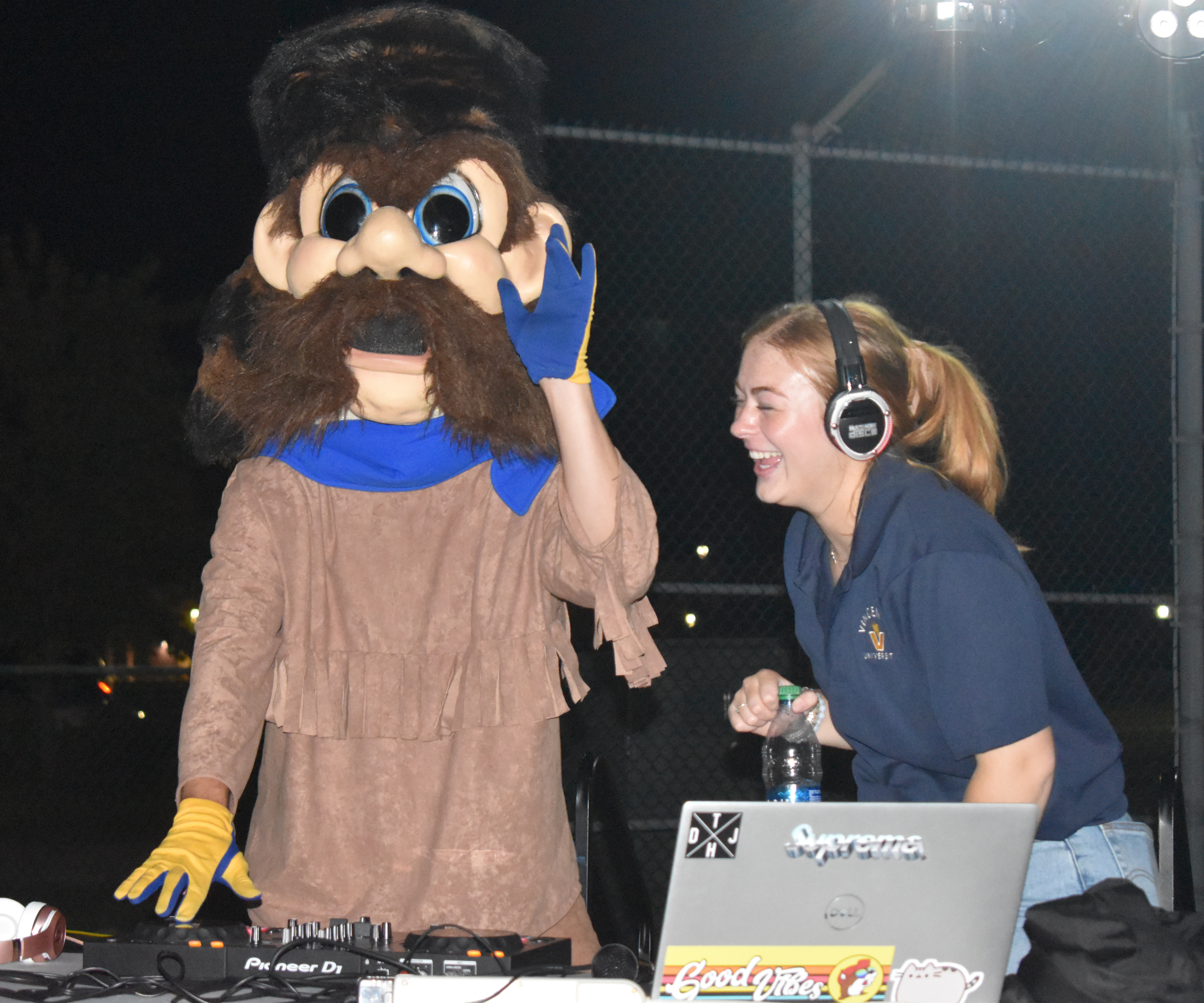 Shelby Liegl and VU mascot Trailblazer Willie DJ at the Silent Headphone Disco during Welcome Week in the fall.
