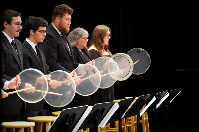 A group of performing arts students performing together