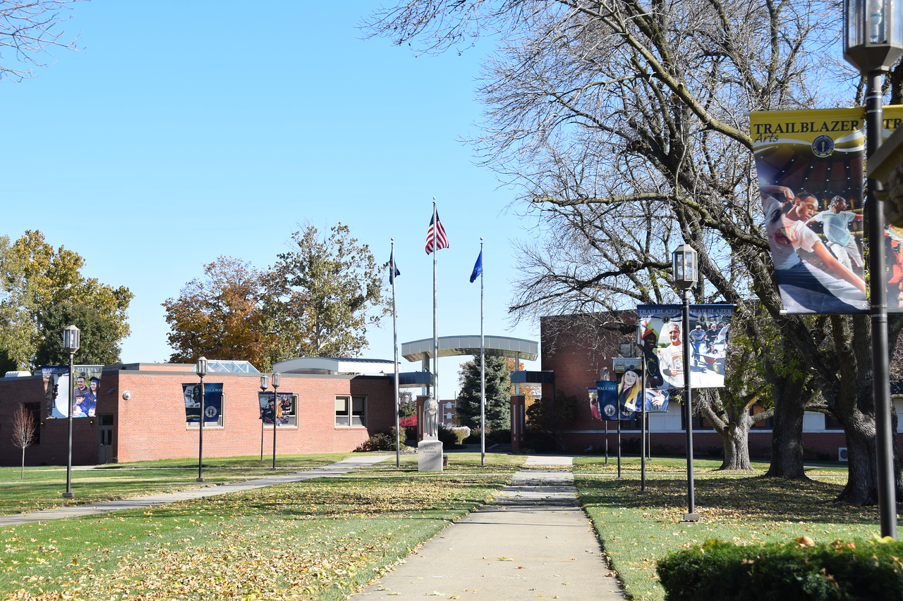 An image of the William Henry Harrison statue with Governor's Hall on the left and the Welsh Administration building on the right